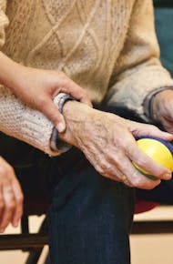 Person Holding a Stress Ball